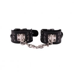 Spiked and studded black leather bondage kit.